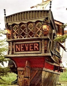 an old pirate ship with a sign that says never