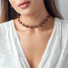 Adorn yourself in the beauty of the Cranberry Necklace. Boasting gems of the finest cranberry luster, accessorize any look with a timeless touch of elegance, for a look of exclusivity that only luxury can provide. DETAILS Plating: 18K Gold Materials: 18K Gold on Brass, Natural Stone Measurements: Length: 13.39"(34cm) + Extender: 3.54"(9cm) Weight: 30.31 g The customized service requires an additional payment, such as extended the necklace Elegant Cranberry Jewelry For Gift, Elegant Ruby Choker As A Gift, Festive Red Gemstone Necklace, Festive Ruby Gemstone Necklace, Elegant Red Garnet Necklace, Elegant Red Coral Necklace With Lobster Clasp, Red Garnet Gemstone Beaded Necklace, Oranges Gift, Fruit Necklace