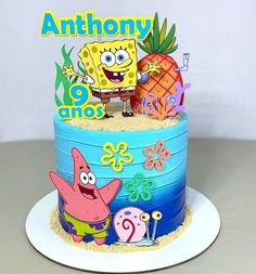 a spongebob themed birthday cake on a plate