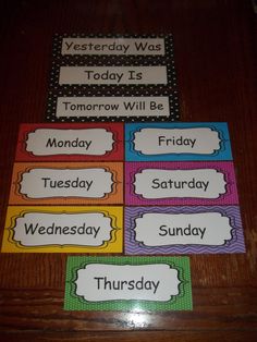 four days of the week cards on a table