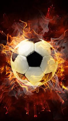 a soccer ball is in the middle of flames