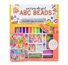 an assortment of beads in a box with the words'personalized abc beads '