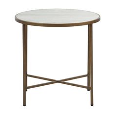 a white marble top side table with gold metal legs and a round wooden frame base