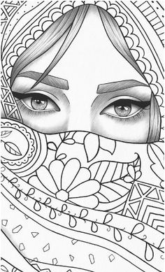 a woman's face is covered by an intricately designed scarf, with her eyes wide open