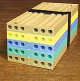 three different colored blocks stacked on top of each other