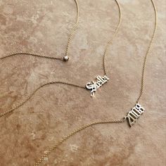 Create custom name & date necklaces in a Gothic font, with your choice of 14k gold color. #staygold Gothic Font, Gothic Fonts, Heart Symbol, Dainty Chain, Chain Lengths