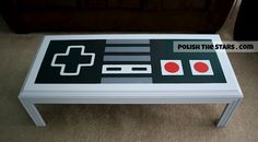 a coffee table made to look like an old school video game console with the words polish the stars on it