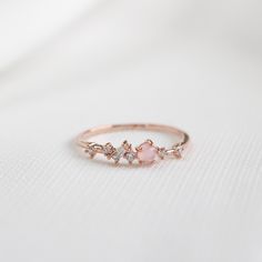 This eclectic ring has an array of crystals in different colours and shapes to form a unique, distinct design. Main material: Rose Gold, Rhodium, 16k Gold Plated on Brass, Cubic Zirconia * Tarnish-resistant protective coating Need some jewelry inspiration? Follow us on Instagram  @statementGrey Affordable Rose Gold Promise Jewelry, Promise Rings Danty, Daily Wear Rings Diamond, Dainty Pink Stackable Rings For Wedding, Dainty Pink Crystal Ring, Minimalist Pink Wedding Rings, Dainty Pink Crystal Promise Ring, Dainty Pink Crystal Ring For Wedding, Dainty Pink Diamond Ring