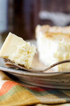 a piece of cake on a plate with a fork