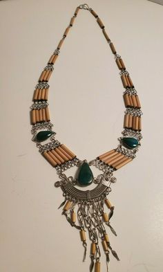 "Vintage costume jewelry necklace dark emerald colored stones. very nice piece, with the 3 dark green emerald colored stones. necklace is not marked. in good condition, please see all photos for details. measures 13\" long. thanks for looking and be sure to check out our other items!" Bohemian Emerald Necklaces With Natural Stones, Green Emerald Bohemian Necklace, Green Metal Costume Jewelry Necklace, Vintage Green Jewelry With Natural Stones, Green Metal Necklace With Natural Stones, Green Necklace With Natural Stones And Metal, Green Necklace With Natural Stones In Metal, Green Necklace With Natural Stones, Bohemian Green Emerald Pendant Necklace