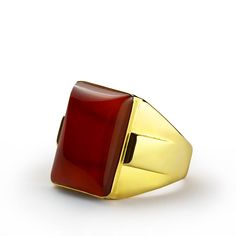 Metal: 14k Yellow Gold Agate: 1.4cm x 1.9cm shape - Rectangular cabochon setting type - Bezel setting Product weight: 10.0 gr Make a lasting impression with this contemporary refined design! Crafted from 14k yellow gold, this ring features one stunning red agate and provides a splash of color, but play it cool knowing you're still the star of the show. ----------------------------------------------------------------------AgateAgate derives its name from the Greek "Agate" - happy. According to an Gold Rings Online, Gold Chain Men, Yellow Gold Mens Rings, 10k Gold Ring, Gold Chains For Men, Mens Ring, Red Agate, Men's Jewelry Rings, Men's Ring