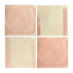 four square pink and white tiles on a white background