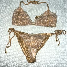 Brand New Never Worn Beach, Bunny, Gold And Laced Bikini Bottoms Are A Size Small Top Is An Extra Large. I Would Say The Top Fits More Like A Medium As Does The Bottoms Obviously They Are Adjustable. Gold Beachwear Swimwear For Spring, Gold Swimwear For Beach In Spring, Beige Party Swimwear For Spring, Gold Beach Cover Up, Elegant Beige Swimwear For Beach, Yellow Gold Shell Jewelry For Beach, Gold Tie-side Swimwear For Vacation, Gold Tie-side Swimwear For Beach Season, Gold Tie-side Bottom Swimwear For Vacation