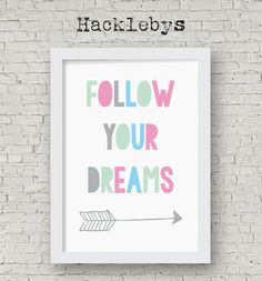 a white frame with the words follow your dreams on it and an arrow pointing up