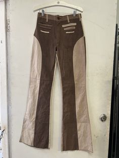 Deadstock 1970s two-toned pants  Tagged a size 2. See measurements.  Waist: 15" for a total 30" waist Total length: 47" Inseam: 36" 1970s Pants, Vintage Brown Flare Bottoms, Vintage Brown Full-length Bottoms, 1970s Fitted Full Length Pants, 1970s Denim Bottoms, Colored Pants Outfits, 1970s Fitted Full-length Pants, 70s Pants, Disco Pants