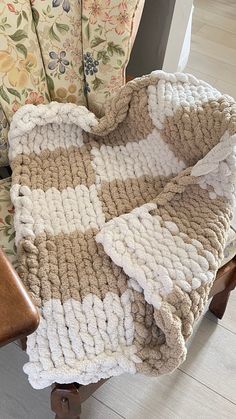 a chair with a blanket on top of it