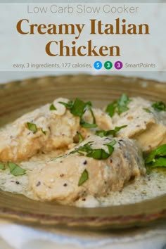 creamy italian chicken with cream sauce in a brown bowl on a white tablecloth and text overlay reads low carb slow cooker creamy italian chicken