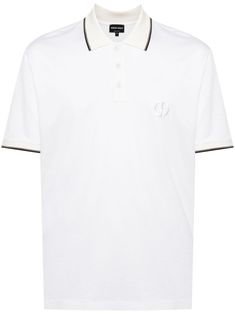 white/black embroidered logo at the chest contrasting trim polo collar short front button fastening drop shoulder short sleeves straight hem Luxury Short Sleeve Polo Shirt, Designer White Tops With Ribbed Collar, Modern White Short Sleeve Polo Shirt, Designer White Polo Shirt, Luxury White Short Sleeve Polo Shirt, Luxury White Polo Shirt With Ribbed Collar, White Top With Contrast Collar, Classic Polo Shirt With Logo Detail, Classic White Polo Shirt With Embroidered Logo