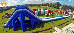 an inflatable water slide on the grass