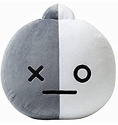 a stuffed animal with an x on it's face is shown in two different colors