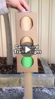 a cardboard traffic light with the words card board traffic light on it