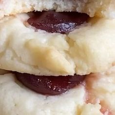 two biscuits with jelly filling on top of each other