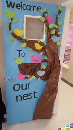 the door to our nest is decorated with paper