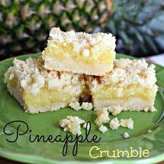 pineapple crumble bars on a green plate with pineapples in the background