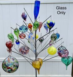 a tree made out of blown glass ornaments