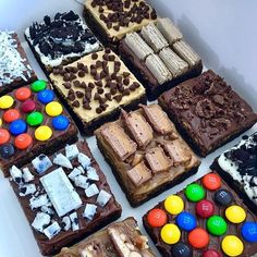 a table topped with lots of different types of desserts