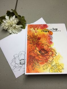 two cards with watercolor flowers on them