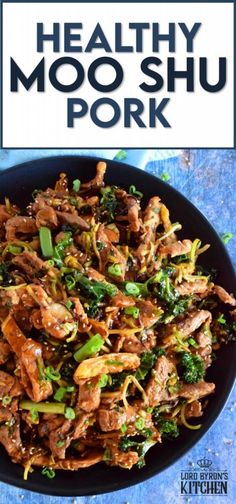 healthy moo shu pork with broccoli in a black bowl