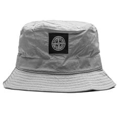 Cotton bucket hat with a regular fit and a classic flap. Features a stitch at the top for a flattering fit with a Stone Island logo. Made in two layers of light slub nylon. Cotton Cuffed Compass patch Style No: 791599376 V0097 Stone Island Logo, Island Logo, Cotton Bucket Hat, Patches Fashion, Classic Flap, Stone Island, Compass, Bucket Hat, ? Logo