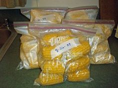 three bags of corn sitting on top of a counter