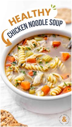 a bowl of chicken noodle soup with crackers on the side and text overlay that reads healthy chicken noodle soup