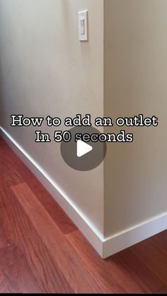 the corner of an empty room with text overlaying how to add an outlet in 50 seconds