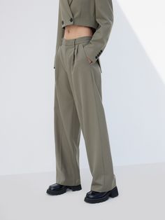 MO&Co. Women's Tailored Straight Suit Pants Features : - Wide leg silhouette- Zipper, hook and button closure- Pleating, wool blend material Code: MBC1PAT004The back length of size M is 106cmMATERIALS & CARE Material: 51.2% Polyester 48.8% WoolDo not water wash, do not bleachHang to dry, do not tumble dryLow temperature iron, professional dry cleaningDo not expose to the sunNote: Snaps together dry clean separatelyPlease select your own size in the size chart according to your figure and serve m Fall Business Wide-leg Pants, Full Length Wool Pants For Spring, Spring Wool Straight Pants, Wool Full Length Pants For Spring, Formal Fall Pants With Button Closure, High-waisted Business Pants With Button Closure, Full Length Solid Wool Pants, Winter Office Bottoms With Button Closure, Business High-waisted Pants With Button Closure