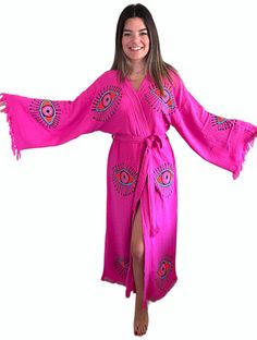 Handmade Evil Eye Festival Boho Kimono Bathrobe; %100 Organic Turkish Cotton You can use our stylish kimonos as; festival clothing, robe, dressing gown, beachwear cover up, bridesmaids gifts, bathrobe, pool&spa clothing, pareo, hammam towels and peshtemals. Due to its extra soft texture; our kimonos are very-well absorbent, quick to dry and eco-friendly. Great choice for the birthday / anniversary / bridesmaids / valentines day gifts. Patterns are handmade woodblock prints. Colors are also handmade,the color is obtained by mixturing several colors. Therefore patterns and colors might be slightly different than each other which makes each pattern unique. All kimonos are woven with high quaity Turkish organic cotton and have OEKO-TEX Certifications. Size: EU 36-42 Standard It can be machine Pink Traditional Dress With Kimono Sleeves, Traditional Pink Dress With Kimono Sleeves, Pink Wrap Beach Dress, Pink Wrap Dress For Vacation, Traditional Pink Summer Kimono, Bohemian Robes, Kimono Beach Cover Up, Kimono Beach, Festival Outfits Women