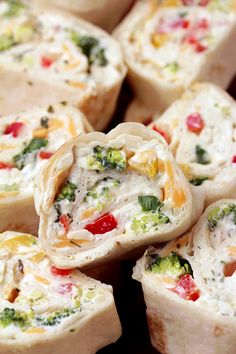 Vegetable Tortilla Roll Ups is a quick and easy appetizer and perfect party bites, made of tortillas filled with cream cheese, mayo, sour cream, spices, cheddar cheese, mozzarella and vegetables, rolled and sliced. These delicious bites that are perfect for every occasion will be loved by all those who prefer quick and easy recipes. Vegetable Tortilla, Cheese Mozzarella, Party Bites, Tortilla Rolls, Roll Ups Tortilla, Pinwheel Recipes, Quick And Easy Appetizers, Party Appetizers Easy, Roll Ups