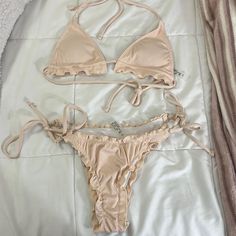 Size: S (Both Top And Bottom) Color: Tan/Light Peach Color Worn Once. Looks Never Worn. In Great Condition. Adjustable Straps On Top And Bottom And Padding Inserts. Comes With The Padding Inside Already. Summer Beige Halter Neck Swimwear, Beige Halter Neck Summer Swimwear, Beige Tie-side Bottom Swimwear For Summer, Beige Triangle Top Swimwear For Summer, Beige Triangle Top Swimwear For Spring, Summer Beige Tie-side Bottom Swimwear, Beige Triangle Top Swimwear, Summer Beige Triangle Top Swimwear, Light Peach Color