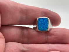 Signet Silver Blue Opal Ring Sizes 7, 8, 9, 10, 11, 12, 13 925 Sterling Silver Face Height: 15mm Weight: 8 plus grams Stone: Lab Created Opal Nickel Free Silver Hallmark 925 Free US Shipping Silver Rose Ring, Blue Opal Ring, Silver Opal Ring, Turquoise Ring Silver, Turquoise Rings, Ring Sizes, Opal Ring, Blue Rings, Opal Jewelry