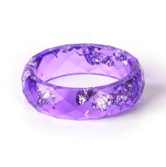 These adorable Colored Resin Rings are perfect for everyday wear. A dashing touch to your accessories and a great way to support animals at risk. You will not only receive compliments but also help to protect our wildlife. This is perfect for you, or as a gift for a loved one. Limited stock, get yours before they're gone Help us raise awareness of the threats animals face. With every Necklace sold you help saving animals across the globe! Help us Save them! Durable Silver Jewelry Gift, Round Durable Jewelry For Gifts, Unique Resin Crystal Ring Gift, Adjustable Nature-inspired Crystal Ring For Gifts, Adjustable Nature-inspired Crystal Ring As Gift, Purple Round Resin Jewelry, Unique Purple Crystal Gift Ring, Unique Purple Crystal Ring As Gift, Family Ring