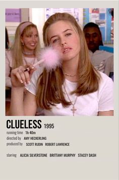 the poster for clue is shown in front of two women, one blowing a dandelion