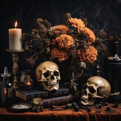 there are two skulls on the table with flowers and candles next to eachother