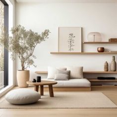 a living room filled with furniture and a large window next to a wooden floored wall