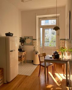 the kitchen is clean and ready to be used as a dining room or living room