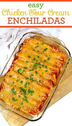 chicken enchiladas in a casserole dish on a wooden cutting board