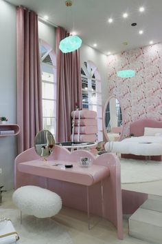 a room with pink furniture and mirrors in it