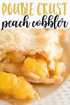 a close up of a piece of food on a plate with the words double crust peach cobbler