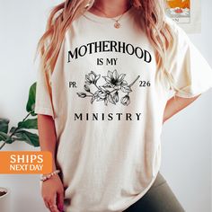 Our handmade Motherhood is my ministry t-shirts are crafted from the highest quality materials for an ultra-soft and comfortable wear. Our trendy Motherhood is my ministry shirts ship the same or next business day and are printed using an eco friendly water based ink that is not only safe for you but also safe for the environment! 💖  Bold and Bloom Co. offers trendy items for any occasion! Our shirts are crafted from the highest quality materials for ultra-soft and comfortable wear. Most import Mother's Day Long Sleeve Custom Print T-shirt, Faith Tshirts, Christian Shirts Designs, Comfort Colors Tshirt, Christian Shirt, Christian Shirts, Mom Shirt, Unisex Shorts, Floral Shirt